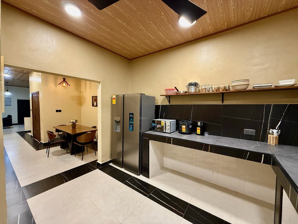 Luxury 2 bedroom, Kitchen with refrigerator and dining table