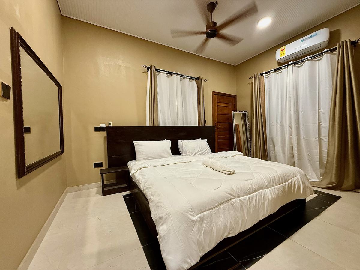 Luxury 2 bedroom, Bedroom with large mirror and AC